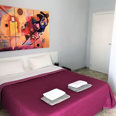 Cavour 124 -guest-room- Couette-café